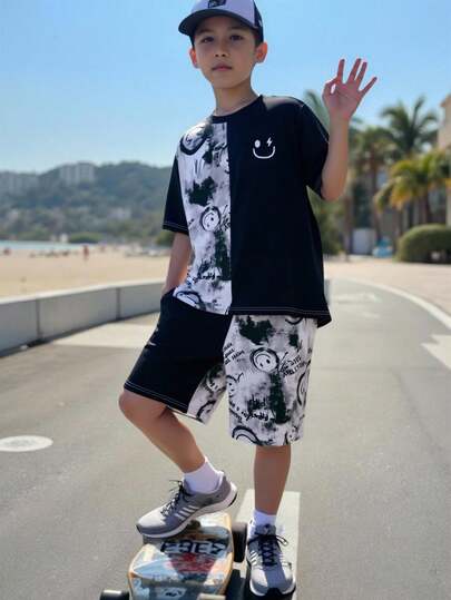 SHEIN Tween BoyLoose Casual Vacation Asymmetrical Striped Short Sleeve T-Shirt And Woven Shorts 2 Pieces Set