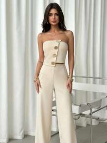 Firerie Bộ đồ nữ màu trơn gồm áo crop top trễ vai, cài cúc kim loại và quần cạp cao xếp ly, trang phục công sở gợi cảm và thanh lịch, thích hợp cho mùa xuân/hè, đi làm, các buổi lễ hội âm nhạc, hẹn hò lãng mạn, tiệc tùng, mùa cưới, lễ tốt nghiệp, dạ hội, biểu diễn, hòa nhạc, đồng phục công sở và nhiều dịp khác. - Màu be - Xem 7