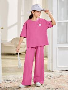 SHEIN 2pcs Tween Girls Casual Loose Comfortable Round Neck Short Sleeve T-Shirt And Pants Set Plain Pink Outfit Two Piece Fit Fuchsia - Hot Pink - View 7