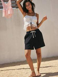 SoleilVie Quần short nữ mùa hè cạp cao, lưng thun, màu mơ, thiết kế dây rút, túi bên hông, vải cotton dệt nhăn mềm mại, kiểu dáng chữ A cơ bản, trang phục thường ngày thoải mái, trang phục mùa hè, quần short nữ thường ngày đa năng và thời trang, quần short đen che ngoài, quần short đen nữ, quần short vải muslin nữ, bộ quần short đen cho nữ, quần short che ngoài đồ bơi, trang phục đi biển cho nữ. - màu đen - Xem 5