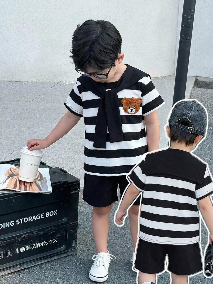 SHEIN 两件套男童休闲运动学院风文艺复古黑白条纹圆领T恤搭配白色短裤,配披肩装饰,适合儿童穿着,适合男童返校穿着,也适合生日派对、晚宴、演出、婚礼、洗礼、开幕式、日常穿着,适合上学、旅行、度假,适合春夏季节穿着。 - 彩色 - 查看 1