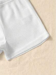 SHEIN Playful Pals 5件套男婴套装，包括5件针织短袖圆领上衣和5条弹力腰针织短裤。上衣颜色有卡其色、灰蓝色、军绿色、棕色和黑色，短裤颜色与之相配。适合春夏季节、户外活动和休闲穿着，尺码为6个月至2-3岁。 - 白色 - 查看 7