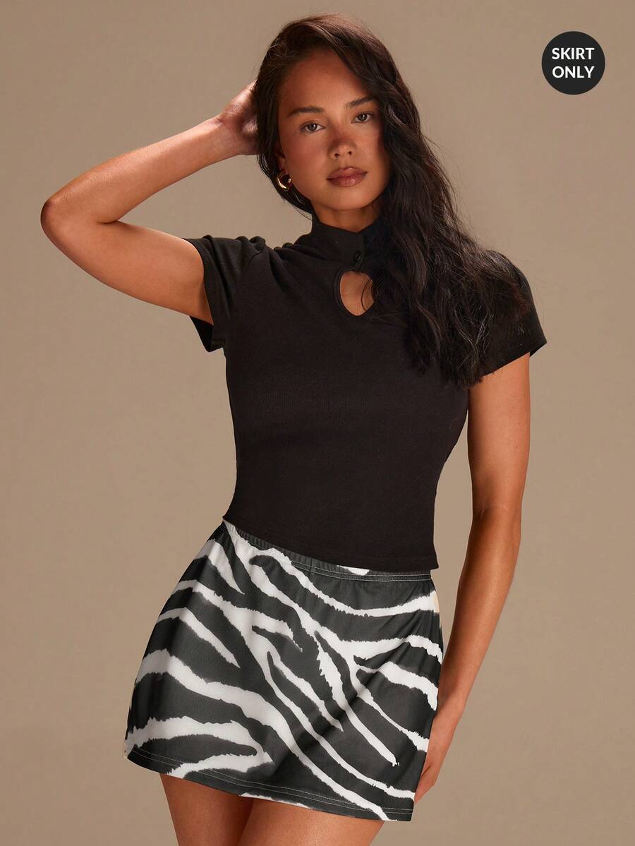 Athîral Falda mini de malla con estampado de cebra de punto casual de vacaciones para mujer, primavera/verano - Blanco y Negro - Ver 1