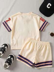 SHEIN Playful Pals 2pcs Baby Toddler Boys' Blue White Stripe Summer Casual Beach Sports V-Neck Short Sleeve Eagle Print T-Shirt + Mesh Shorts Set,Green Stripe,6M-3Y - Apricot - View 2