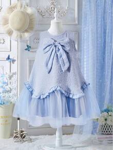 Đầm jacquard không tay màu xanh thanh lịch dành cho bé gái, điểm nhấn là nơ xếp ly bằng lưới màu xanh, thích hợp cho bé gái đi dự tiệc, sự kiện và mặc hàng ngày. - Màu xanh lam - Xem 4