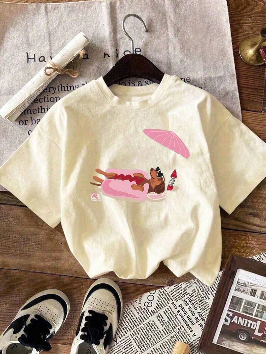 SHEIN LUNE Áo thun nữ mùa hè mới in hình chó Dachshund, kiểu dáng rộng rãi, thoải mái, cổ tròn, tay ngắn, màu be, thích hợp mặc hàng ngày, đi biển. - Màu be - Xem 1
