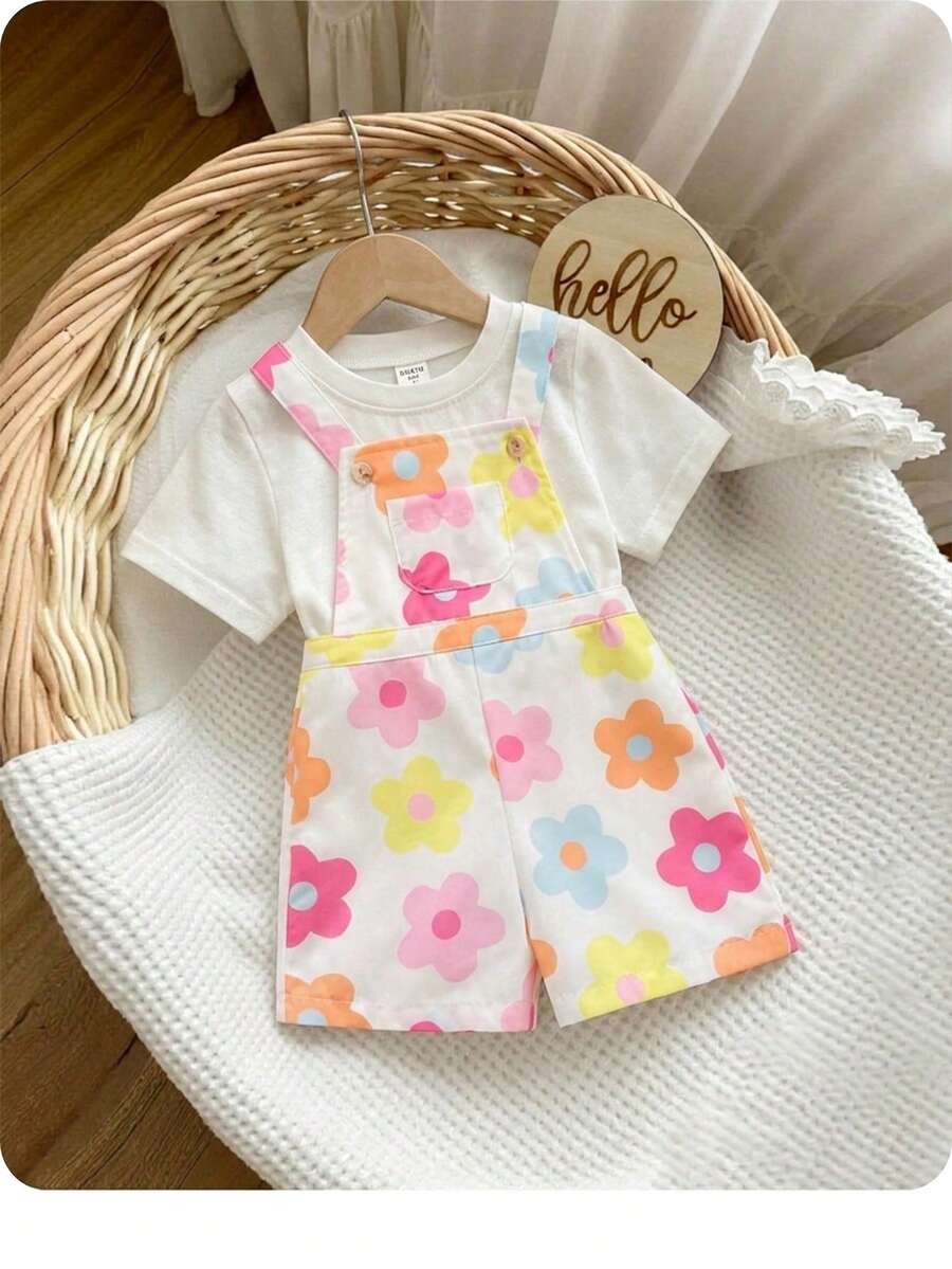 SHEIN Bộ áo liền quần cho bé gái kiểu dáng thường ngày, đa năng, dễ thương với họa tiết hoa. - Nhiều màu - Xem 1