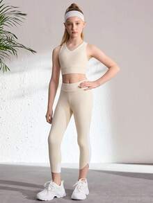 Bộ áo vest và quần capri thời trang cho bé gái tuổi teen – Áo crop top không tay, lưng chéo, phối cùng quần capri ôm sát, bộ trang phục sành điệu cho những buổi đi chơi thường ngày và mặc được quanh năm. - Màu be - Xem 2