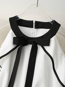 Franclia 女士春夏新款黑白撞色露肩蝴蝶结领休闲中长连衣裙，适合通勤、派对、度假、下午茶等场合。白色复古连衣裙，白色蝴蝶结连衣裙，白色优雅连衣裙，黑白连衣裙，女士优雅别致连衣裙，女士裹身连衣裙，XS码女士连衣裙，游艇连衣裙，Ycv9w女士连衣裙折扣码，惊艳连衣裙，女士精美连衣裙，晚宴礼服，女士雪纺连衣裙，优雅白色黑色蝴蝶结连衣裙，女士正装 - 黑與白 - 查看 6