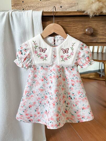 SHEIN Vintaside Kids 1 pieza Vestido básico de manga corta para niñas bebé, cómodo y casual, de tela texturizada de grosor regular, con cuello lindo y bordado floral, estilo línea A, versátil, adecuado para primavera/verano, uso diario, hogar, salidas, viajes, escuela