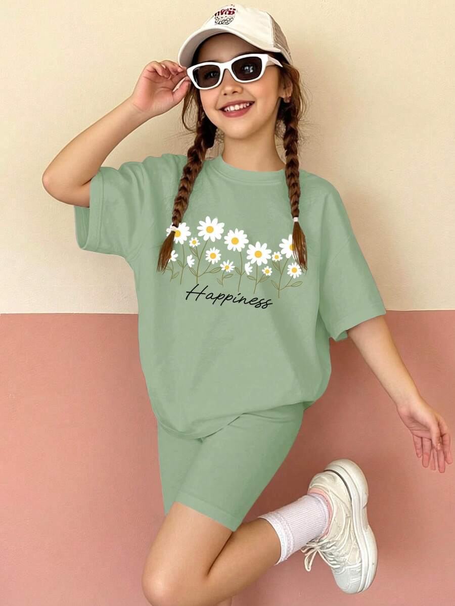 绿色简约优雅印花少女休闲舒适柔软圆领宽松短袖T恤搭配修身骑行短裤套装,适合日常穿着、街头风、外出、居家、度假、野餐、农场、返校节等场合。春夏少女服装套装,宽松T恤,适合儿童、青少年女孩,春季服装套装。 - 白色 - 查看 1