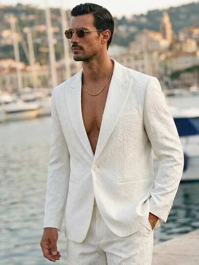 HIMLAND 男士纯色缺角翻领单排扣休闲西装外套，适合办公、通勤、婚礼等场合。