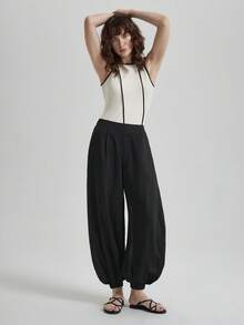 Ontre 2026夏季新款黑色弹力腰百搭灯笼裤连衣裙，适合春夏季节都市通勤、度假、海滩、音乐节等场合，休闲简约，优雅简约，是都市通勤的理想之选，也是女士夏季度假装扮、节日女装和女士休闲服饰的完美搭配。 - 黑色 - 查看 6