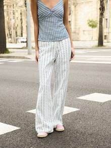 Nöista High-Waisted Denim Pants 4 Pockets, Feature A Vertical Print Stripe Pattern With A Flared Leg Design. Spring, Summer, Easter - Blue - View 1