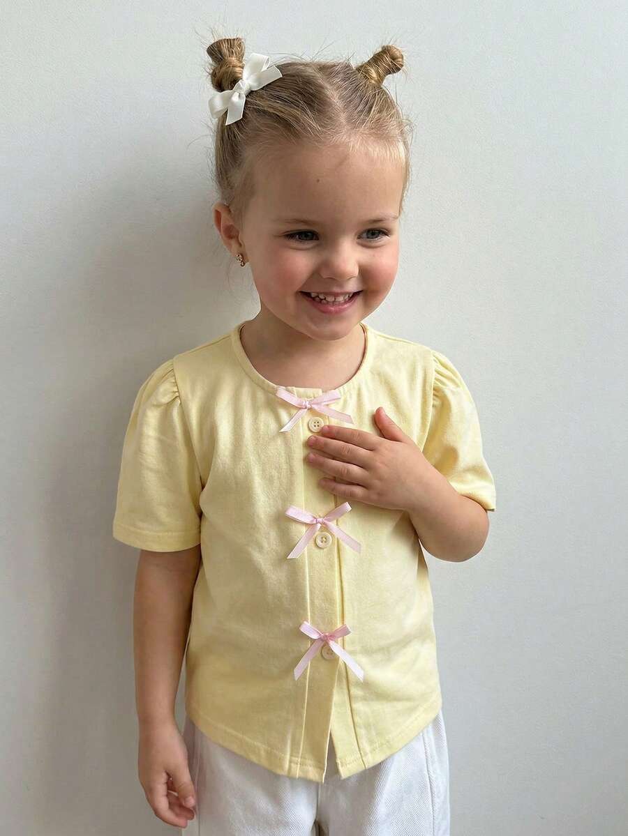 DAZY Young Girl Bow Decor Front Button Round Neck Short Sleeve T-Shirt - Yellow - View 1