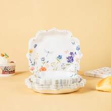 Bộ đồ dùng ăn uống dùng một lần gồm đĩa, khăn ăn, cốc giấy và các vật dụng trang trí tiệc dùng một lần khác, với họa tiết hoa bốn cánh trên nền trắng, phù hợp cho 16 khách, sinh nhật, đám cưới, tiệc theo chủ đề và dã ngoại gia đình. Đĩa ăn và dụng cụ ăn uống dùng một lần cho tiệc tùng. - Xem 3