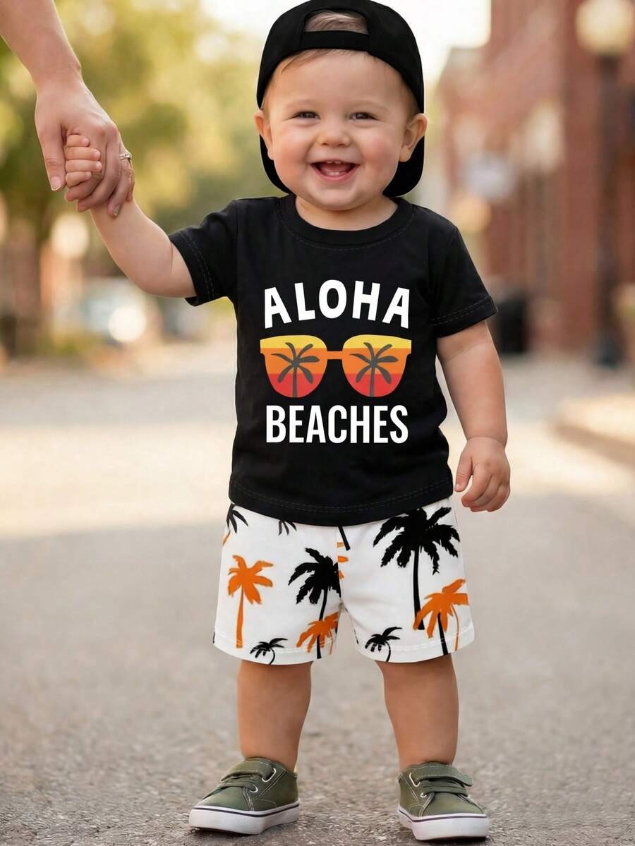 Bộ đồ thể thao mùa hè cho bé trai gồm áo thun ngắn tay và quần short in hình cây dừa và chữ "ALOHA BEACHES", thích hợp cho dã ngoại, đi biển, nghỉ mát và sinh hoạt thường ngày. - Nhiều màu - Xem 1