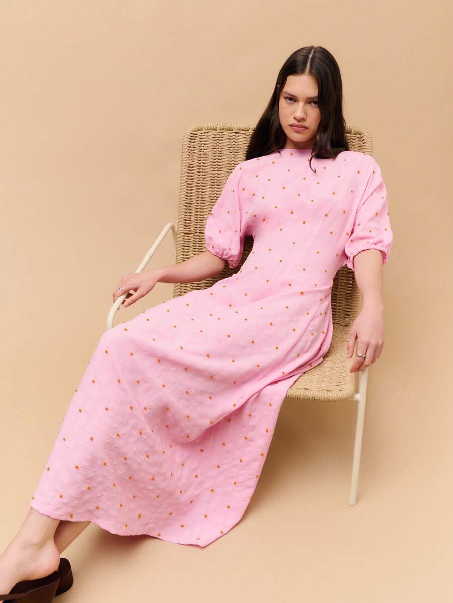 Nöista 粉色面料长裙，饰有橙色圆点，泡泡袖至肘部，腰部收紧，裙摆宽松。适合夏季、春季、音乐节、休闲、海滩、度假、假日等场合穿着。 - 粉色 - 查看 1
