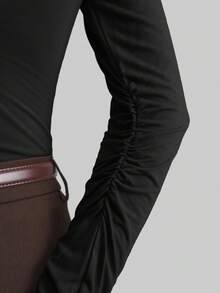 Ontre Áo sơ mi nữ công sở tay dài, màu cà phê mới, cổ xếp ly bất đối xứng, kiểu dáng tối giản, phong cách đô thị thường ngày, thích hợp mặc đi làm vào mùa xuân/hè 2026. - màu đen - Xem 5