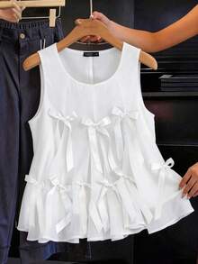 GlowEve CURVE Một chiếc áo vest lưới thắt nơ trẻ trung, tạo nên bầu không khí năng động, kết hợp với áo không tay xếp nếp. - trắng - Xem 4