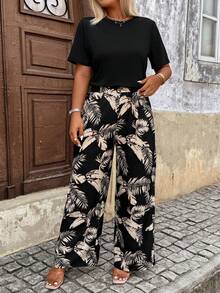 Breezaya 女士加大码印花梭织面料圆领短袖宽松直筒衬衫搭配长裤，舒适百搭，适合度假、优雅、职业或休闲场合。 - 彩色 - 查看 4