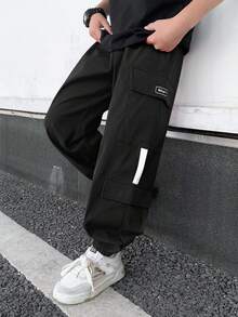 SHEIN Tween Boys' Casual Comfortable Elastic Waist Loose Solid Color Woven Pants - Black - View 4