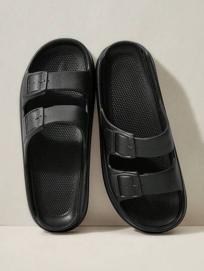 Cuccoo Dép lê đế xuồng hai khóa cài đơn giản, màu đen, chất liệu EVA mềm mại, co giãn, chống trơn trượt, thích hợp cho phòng ngủ và phòng khách, êm ái và không gây khó chịu cho chân. Phù hợp cho cả nam và nữ.