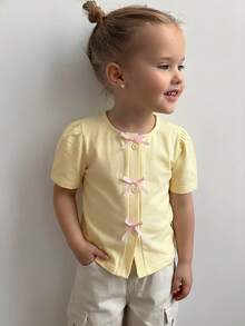 DAZY Young Girl Bow Decor Front Button Round Neck Short Sleeve T-Shirt - Yellow - View 2