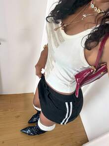 StreetHx Chân váy denim ngắn nữ kiểu dáng thường ngày, có sọc bên hông, dệt kim và thắt lưng. - màu đen - Xem 6