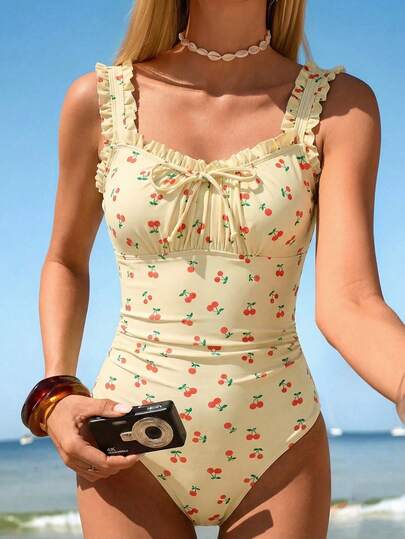 Swim Mod Bộ đồ bơi liền thân màu đen anh đào kiểu retro mới năm 2026 dành cho nữ, dây đeo vai rộng có thể điều chỉnh với bèo nhún dễ thương, phần ngực trang trí nơ, eo xếp ly, phong cách thời trang đi biển cho kỳ nghỉ hè.