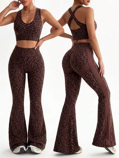 Dewbera Bộ đồ thể thao nữ họa tiết da báo: áo croptop hở lưng và quần ống loe.