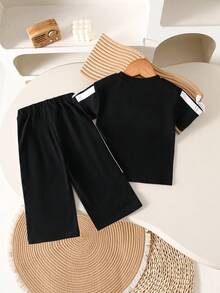 Bộ 2 món cho bé gái 0-3 tuổi, kiểu dáng thường ngày, đa năng, phong cách đường phố, gồm áo thun và quần màu đen. - màu đen - Xem 2