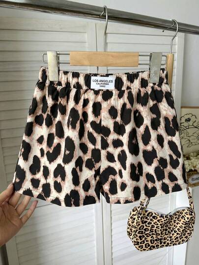 SHEIN Quần short dáng rộng họa tiết da báo cho bé gái tuổi teen, thời trang thường ngày, đa năng.