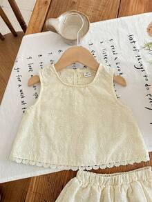Emery Rose Kids Emery Rose Kids 少女编织刺绣纯色圆领不对称蕾丝下摆休闲上衣和迷你裙两件套，可爱、优雅、甜美、复古又时尚。适合妈妈、女儿、姐妹搭配，度假、节日、上学、日常穿着、居家聚会和特殊场合，春夏皆宜。 - 米色 - 查看 5