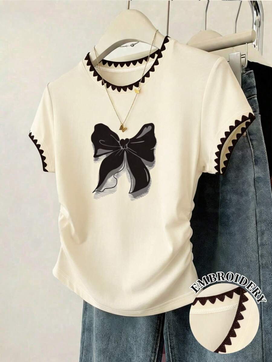 Resyla 女士图案T恤，犬牙刺绣设计，返校季新款，蝴蝶印花，夏季新品，修身腰身，杏色，百搭优雅，适合办公和休闲场合穿着。 - 彩色 - 查看 1