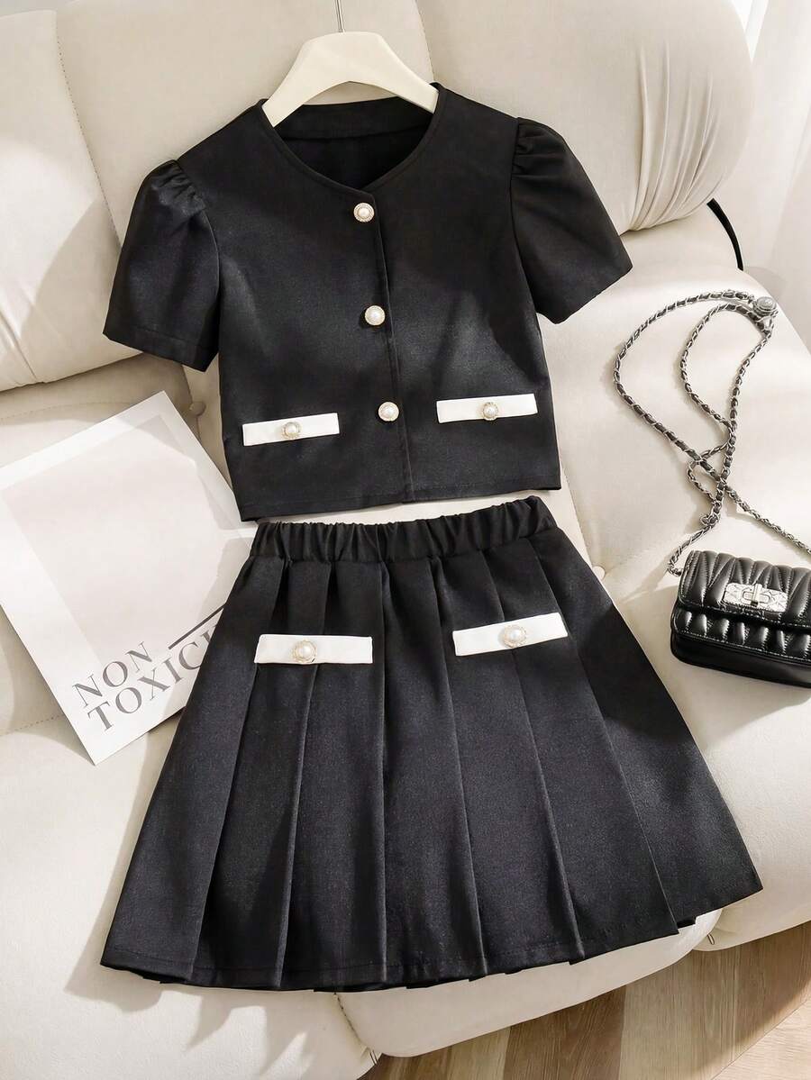 SHEIN Áo sơ mi ngắn tay cổ tròn cài một hàng khuy và chân váy xếp ly ngắn dành cho bé gái - Trang phục thường ngày cho kỳ nghỉ. - Đen và trắng - Xem 1