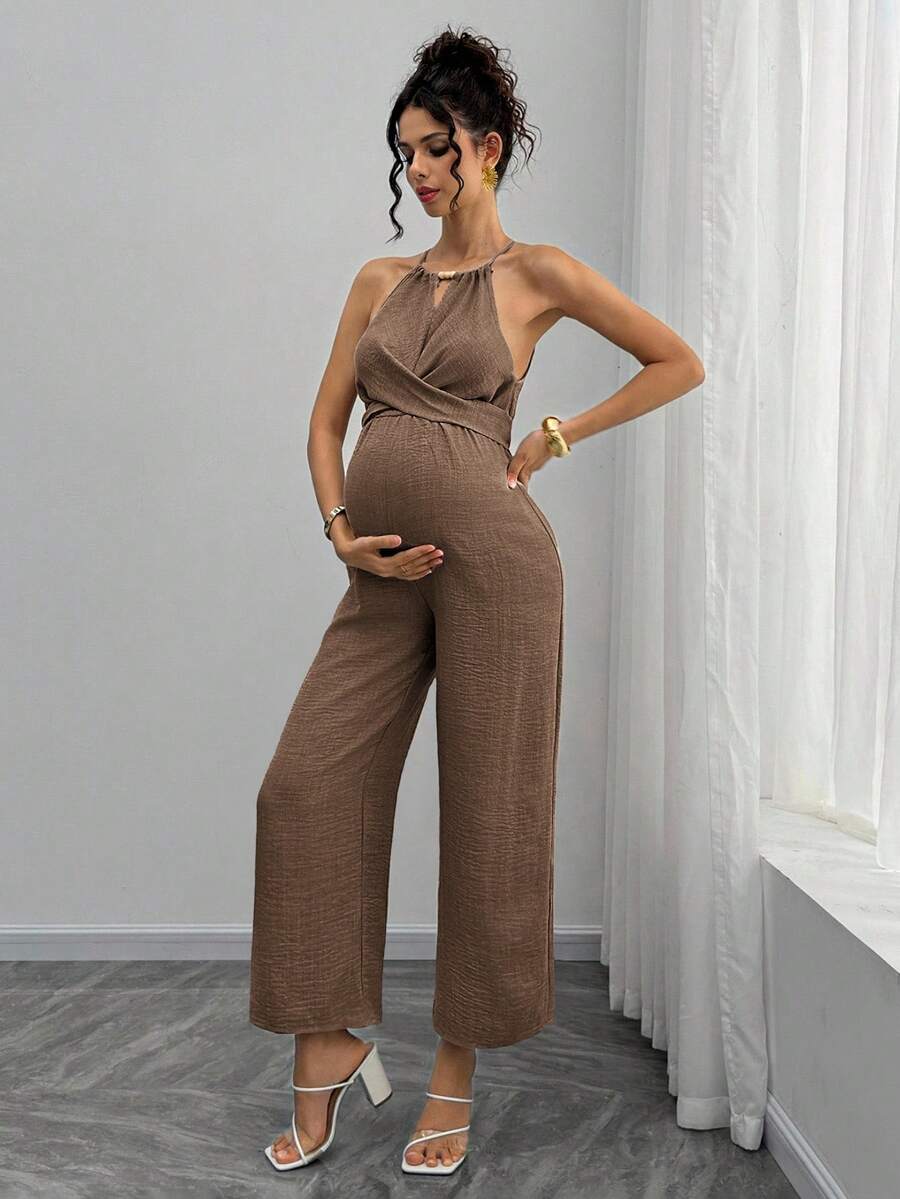 Momance Bộ áo liền quần bầu với cổ yếm đính hạt gỗ, chi tiết nơ thắt eo phía trước, quần dài đến mắt cá chân. Quần áo bà bầu, trang phục dự tiệc mừng em bé, áo liền quần bầu cho phụ nữ, áo liền quần cho bà bầu, trang phục bà bầu, áo liền quần cho phụ nữ mang thai, trang phục bà bầu, áo liền quần nữ. - màu nâu - Xem 1