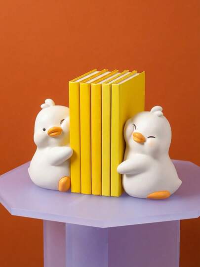 Joivida 1pc Interdependent Duck-Shaped Book Holder, A Warm And Adorable White And Orange Color Solid Ceramic Decorative Piece With Vivid Expressions On The Cheeks, A Non-Slip Bottom For A Creative Book Holder Or Desktop Decoration. Suitable For Home Decoration, Housewarming Gifts, Bookshelf Storage, And Scenarios Of Providing Comfort And Companionship.