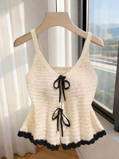 Franclia Women's Knitted Top With A Bow Tie, Ruffled Hem, V-Neck, Fitted Waist, And Contrasting Black Trim. Suitable For Summer, Outings, Beach, Vacations, Spring, Casual Summer, Knitwear, Work, And French Style. Features A Bow Tie At The Front.Graduation Season Attire, Fashionable Casual Commuter Wear, Business Office Wear, Versatile And Stylish Everyday Casual Wear, Urban Teacher's Professional Attire