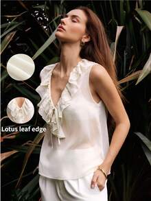 Maija 杏色荷叶边下摆透视无袖背心，适合婚礼、都市场合；白色马甲，适合婚礼派对、毕业典礼、生日等场合；优雅奶油色上衣；夏季荷叶边上衣；无袖上衣；半透明上衣；白色无袖荷叶边上衣；女士上衣和衬衫；夏季女士上衣；优雅女士透视上衣；米白色女士上衣；休闲现代女士衬衫 - 杏色 - 查看 1