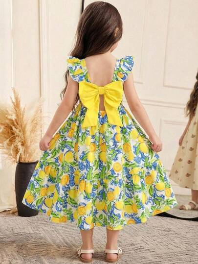 SHEIN Vestido casual minimalista y cómodo para niña con patrón de limón y lazo de color contrastante