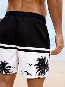 Manfinity Swimmode Shorts de playa con cordón y estampado de palmeras en bloques de color para hombres de talla grande - Blanco y Negro - Ver 2