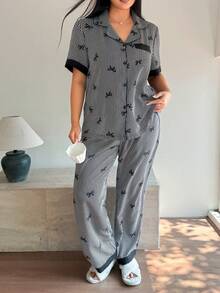 Napfluff CURVE Napfluff CURVE Bộ đồ ngủ cỡ lớn phối màu, cổ bèo nhún, nơ, tay ngắn kẻ sọc, đồ ngủ kẻ sọc ngang, bộ đồ ngủ nơ, bộ đồ ngủ nữ, họa tiết kẻ sọc nơ đen, thích hợp cho mùa xuân và mùa hè. - màu đen - Xem 5