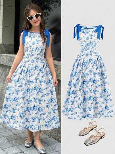 SHEIN Vestido de media manga sin mangas con estampado floral azul y blanco, decoración de lazo y bloqueo de color para niñas