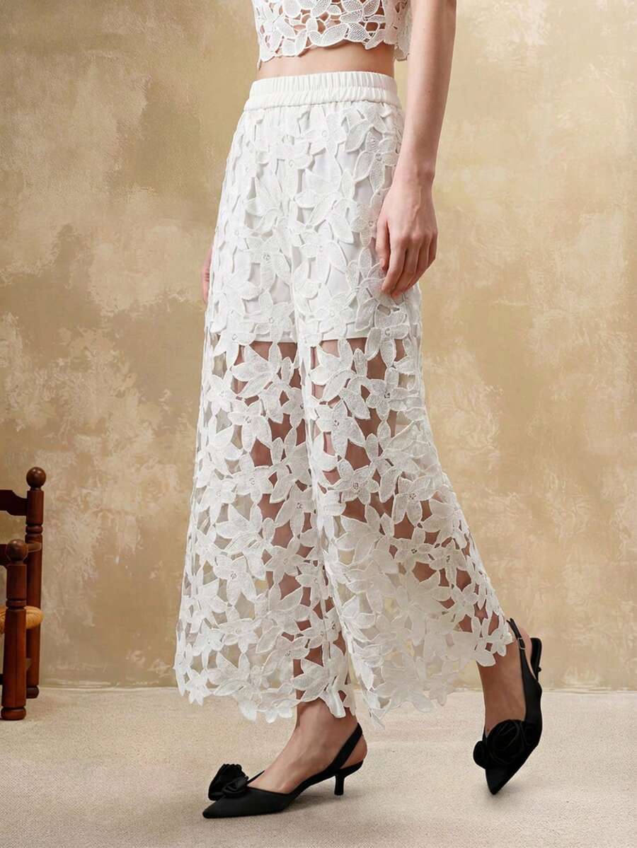 Arave Quần ống loe chữ A cạp cao khoét rỗng thêu hoa dành cho nữ, thiết kế bất đối xứng, thích hợp mặc đi làm hàng ngày. - trắng - Xem 1