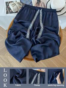 GlowEve CURVE Pantalones de pierna ancha con cinturón de encaje de contraste de satén jacquard para mujer de talla grande - Negro - Ver 1