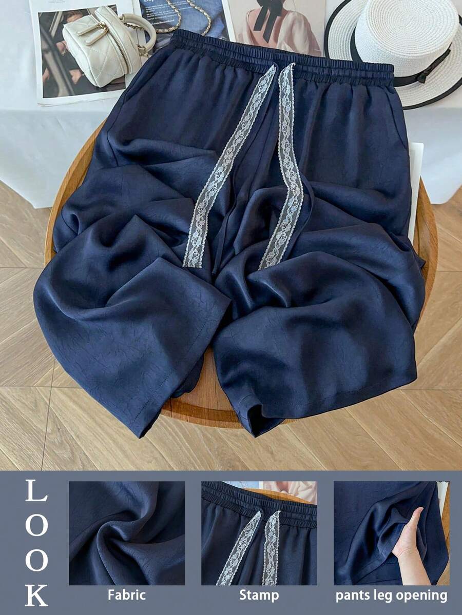 GlowEve CURVE Pantalones de pierna ancha con cinturón de encaje de contraste de satén jacquard para mujer de talla grande - Negro - Ver 1