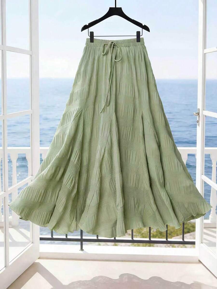 Modelyn Chân váy xanh lá cây mềm mại, rủ nhẹ, có họa tiết, dáng bất đối xứng, cạp chun co giãn, kiểu dáng suông, thanh lịch. - màu xanh lá - Xem 1