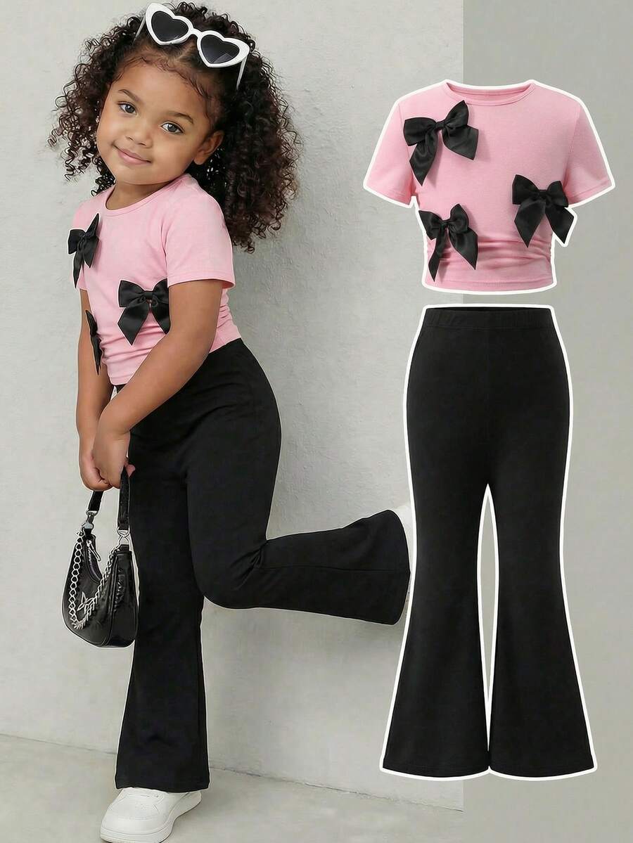 2pcs/Set Young Girl Cute Bow Decor Pink T-Shirt And Black Flared Pants Set Young Girl Outfit Sets Young Girl Outfits Sets Pants Tween Girls Clothing Bow Outfit Kid Girl Clothes Set Children Fashion Girlset Suitable For Daily Wear, Spring & Summer Outfits Suitable For Summer, Street Style, Casual Campus Sports, Outdoor Picnic, Street Photography, Home Girls Flared Pants Sets Young Girls Outfit Sets Girls 2 Piece Trouser Set - Pink - View 1