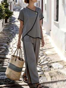 Breezaya 女士夏季休闲度假套装，杏色纹理面料，撞色滚边，不规则领口和下摆上衣，纽扣装饰，侧开衩阔腿长裤带口袋，适合通勤、日常穿着、冬季、春季、秋季、会议、商务谈判、日常办公、约会、都市教师工作服、圣诞新年装扮、休闲聚会、旅行等场合，干练、优雅、简约，四季皆宜。 - 灰色 - 查看 1